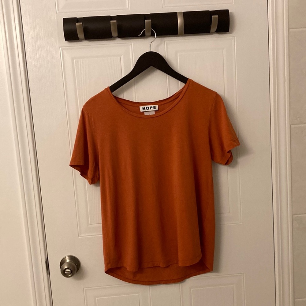 Hope t-shirt orange size 38 fits small and medium.